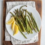 plated lemon and baked air fryer asparagus