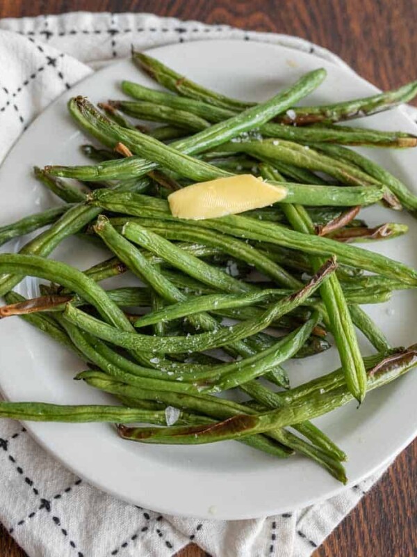 plated air fryer green beans with butter and salt