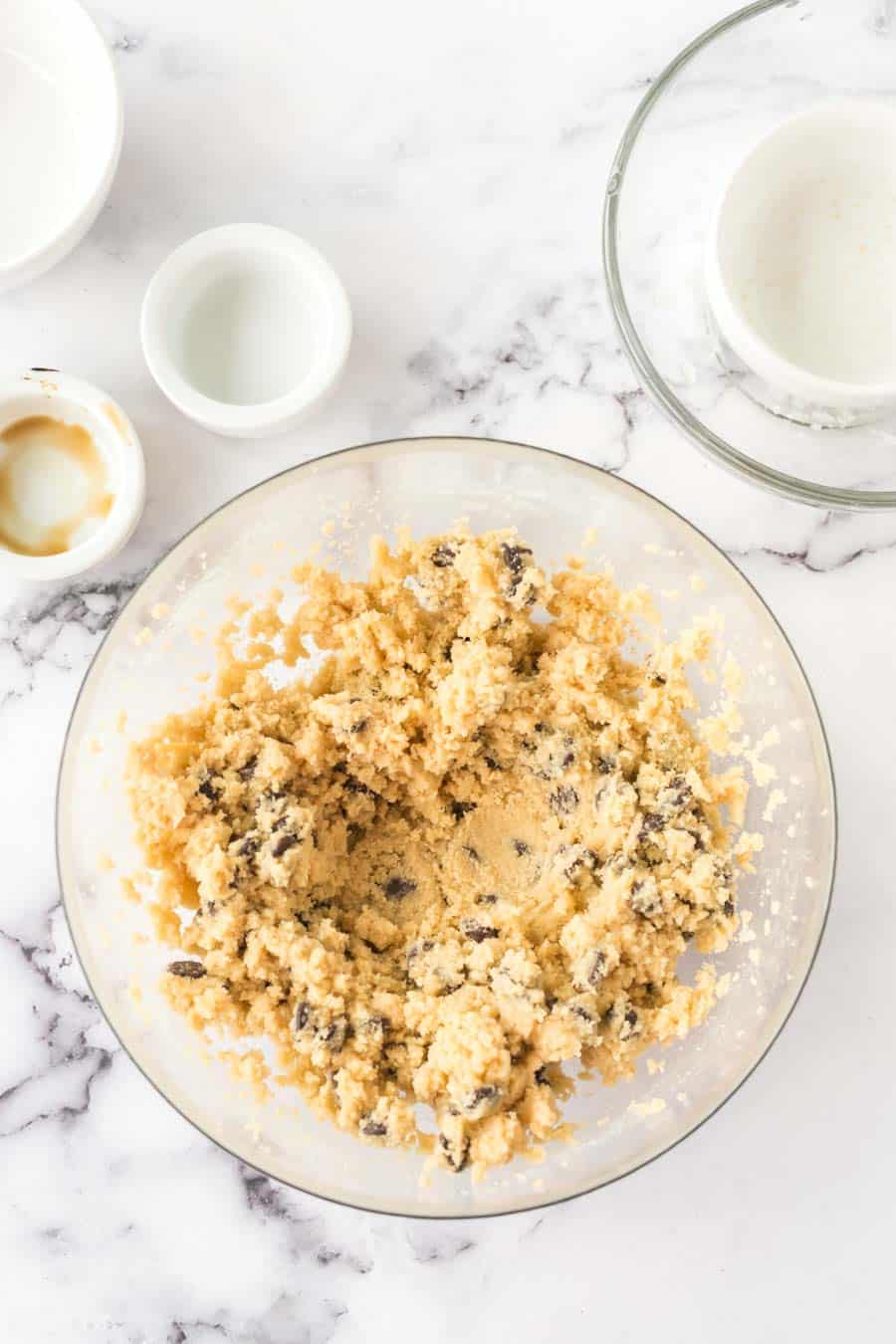 mixing bowl of cookie dough ingredients