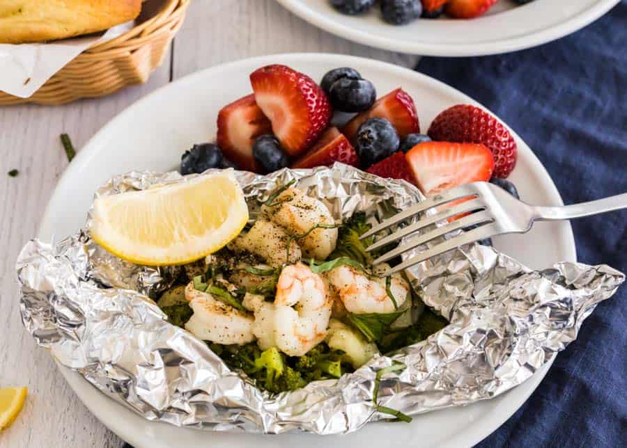 grilled shrimp foil packet dinner on a plate