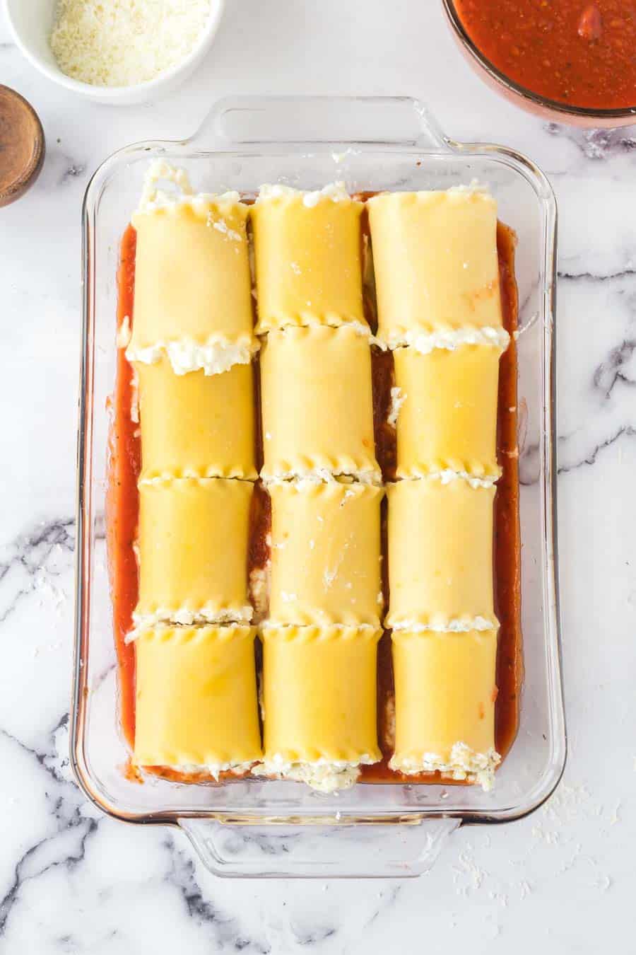 lasagna roll up ingredients in construction, layer into a baking dish