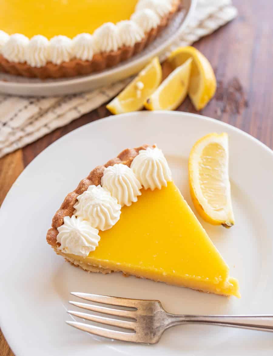 one slice of lemon tart served on a plate