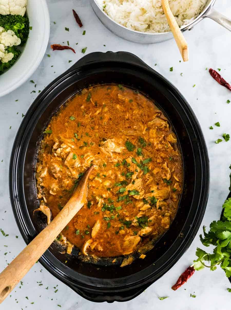 slow cooker chicken tikka masala seasoned in the slow cooker