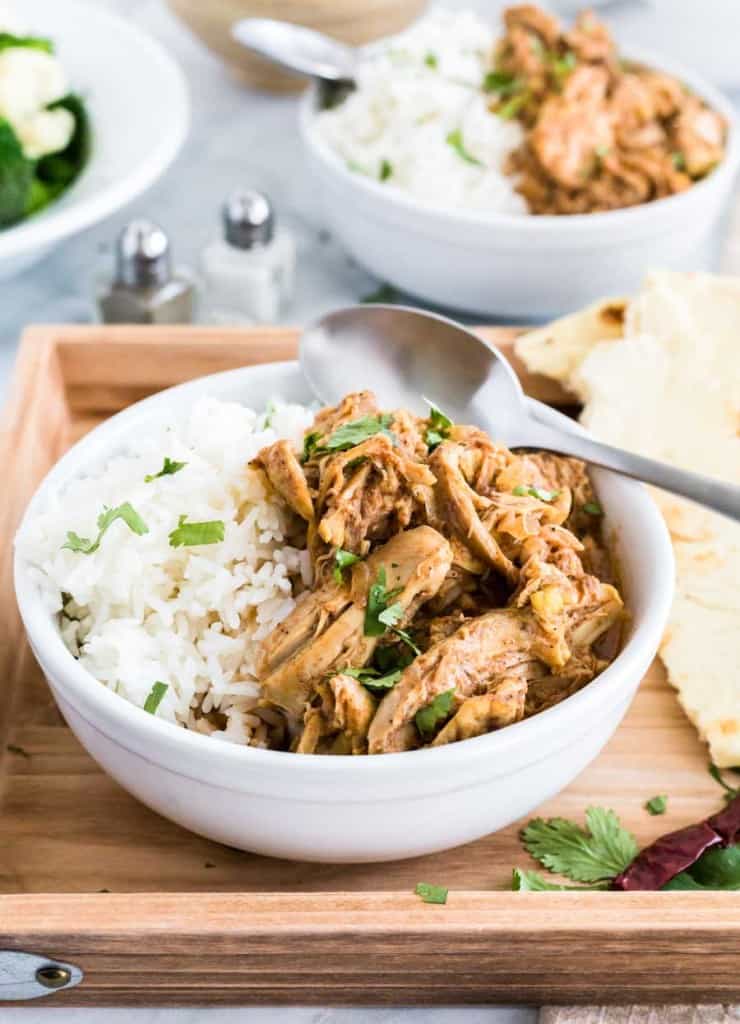 slow cooker chicken tikka masala in a white bowl