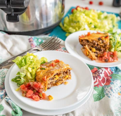 slow cooker enchilada dinner on a plate