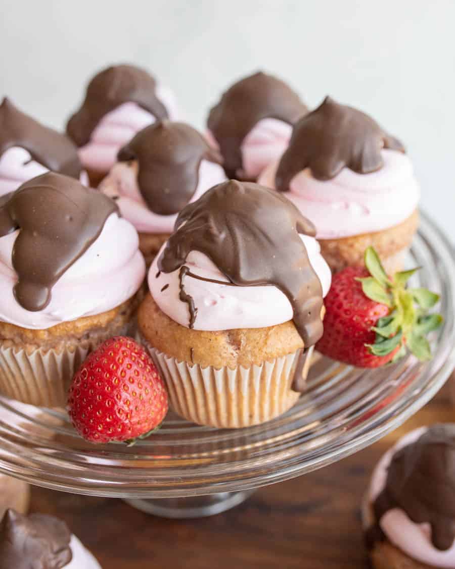 strawberry cupcakes with chocolate on top