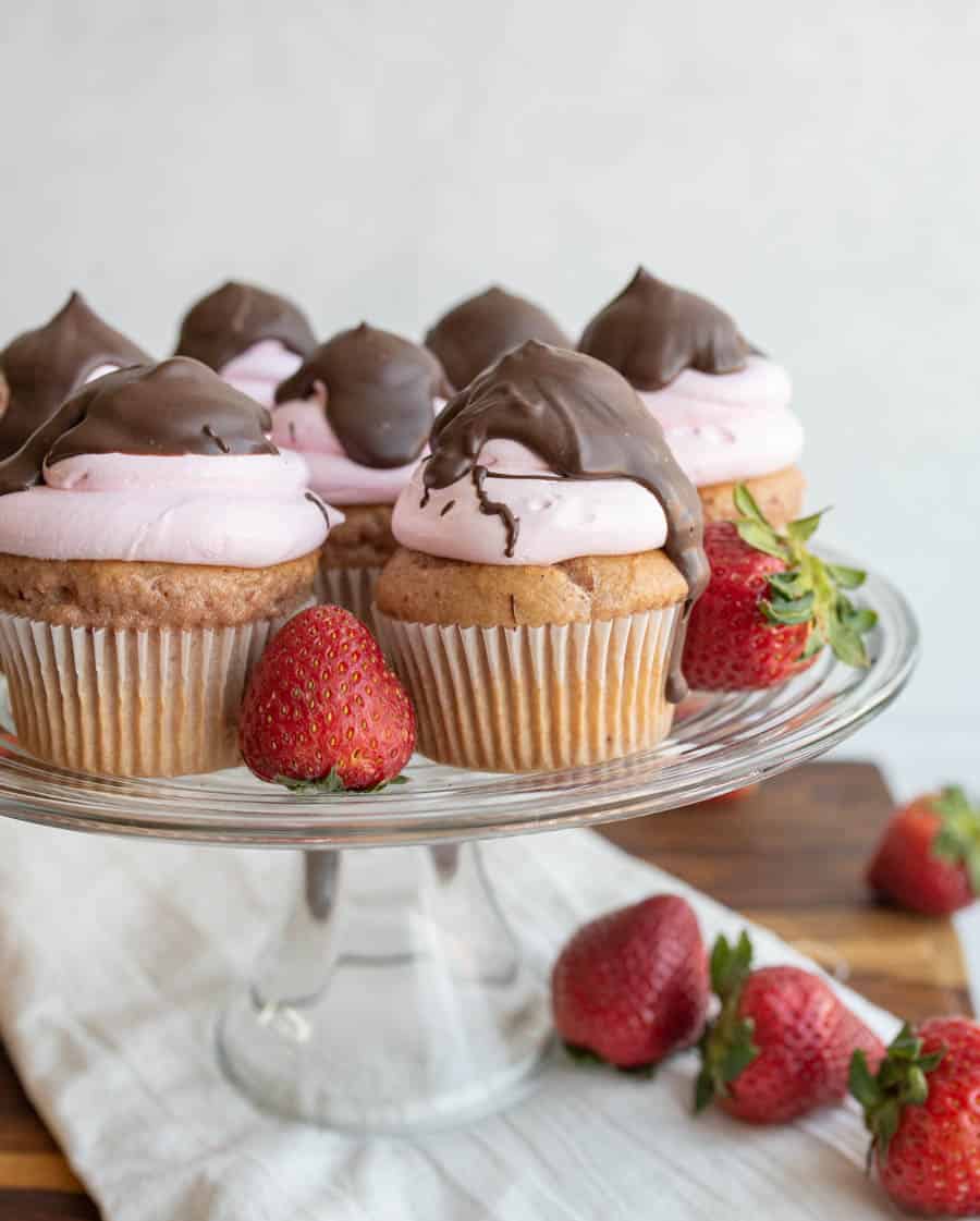 strawberry cupcakes with chocolate on top