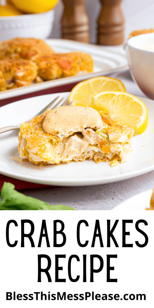 pin for crab cake recipe with golden crusted crab cakes, some with sauce on top, and beautiful sliced lemons all around