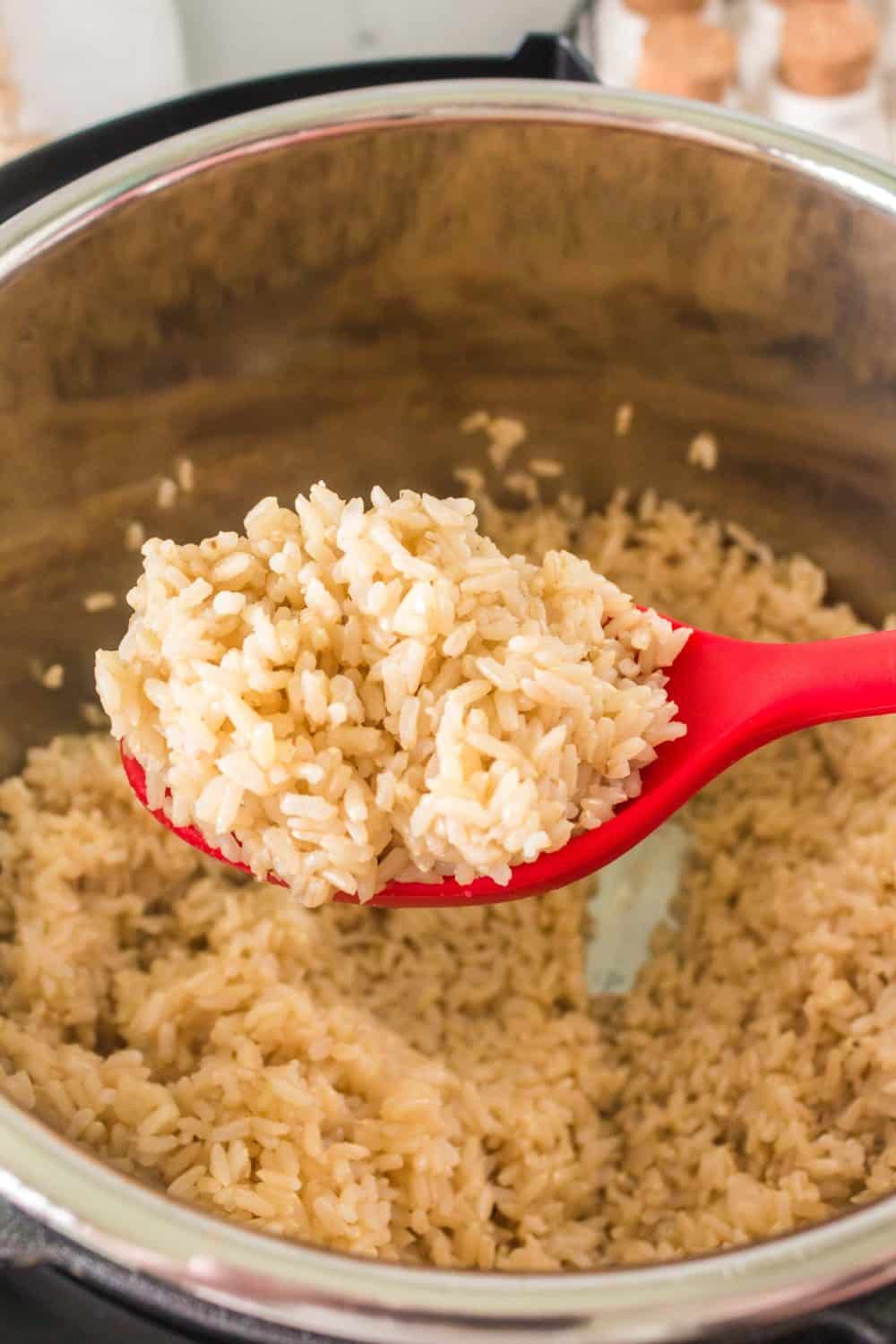 rice on a red spoon