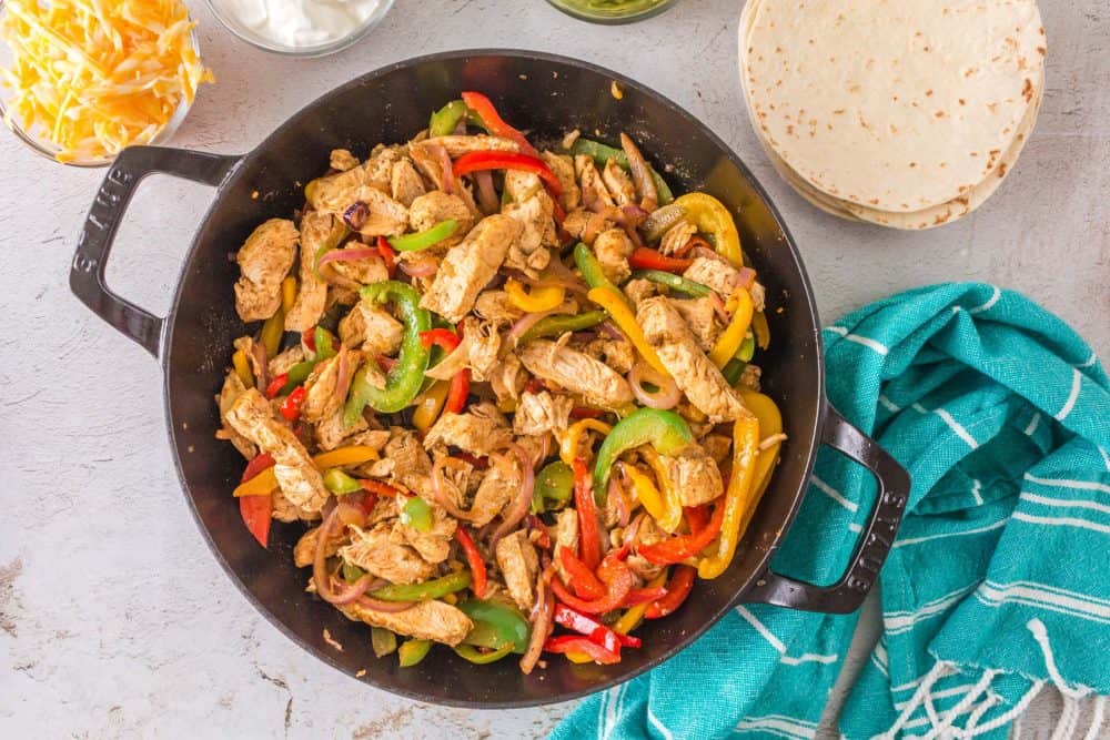 chicken fajita fixings in a pan