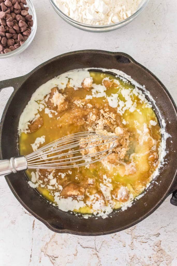 melted butter with sugar getting mixed in in skillet