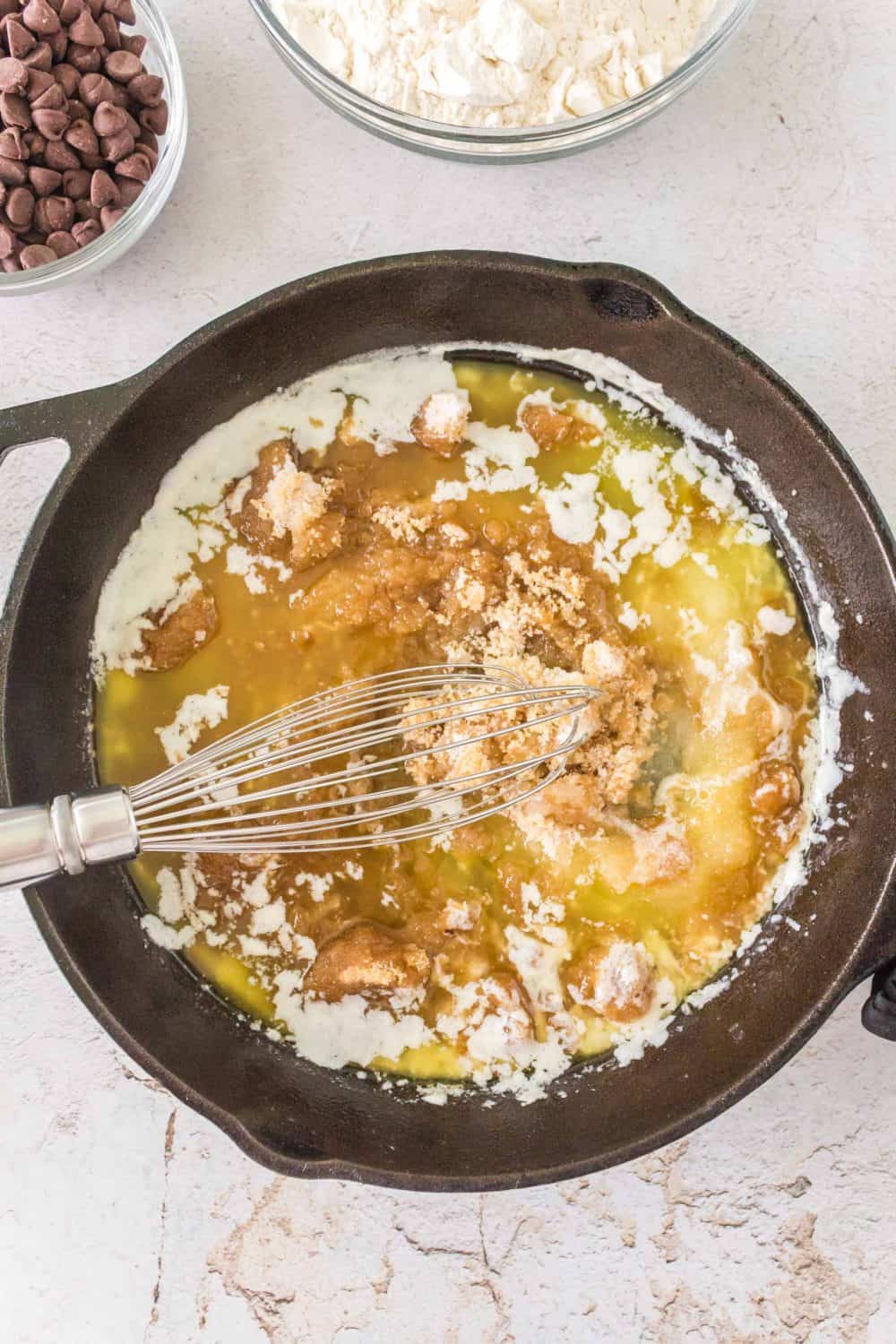 melted butter with sugar getting mixed in in skillet