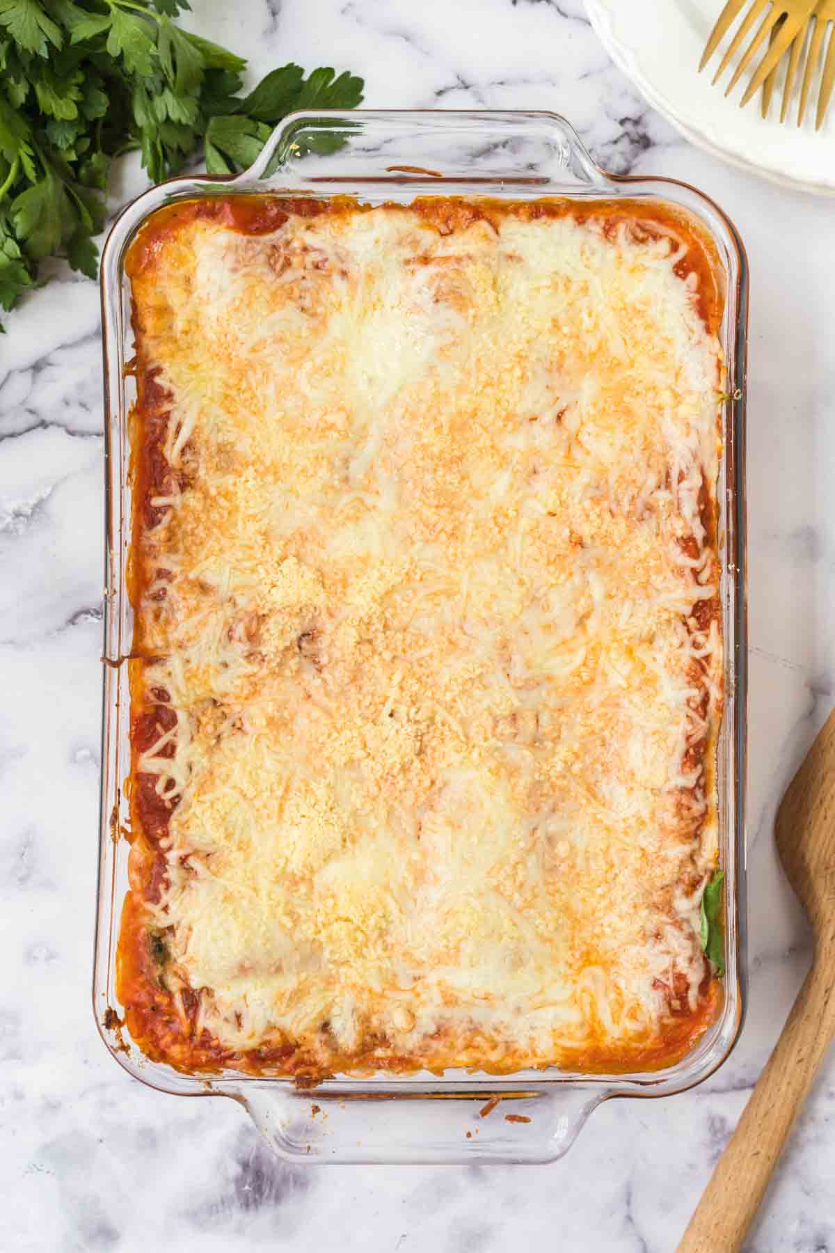 top view of crispy baked cheese over the dish of lasagna