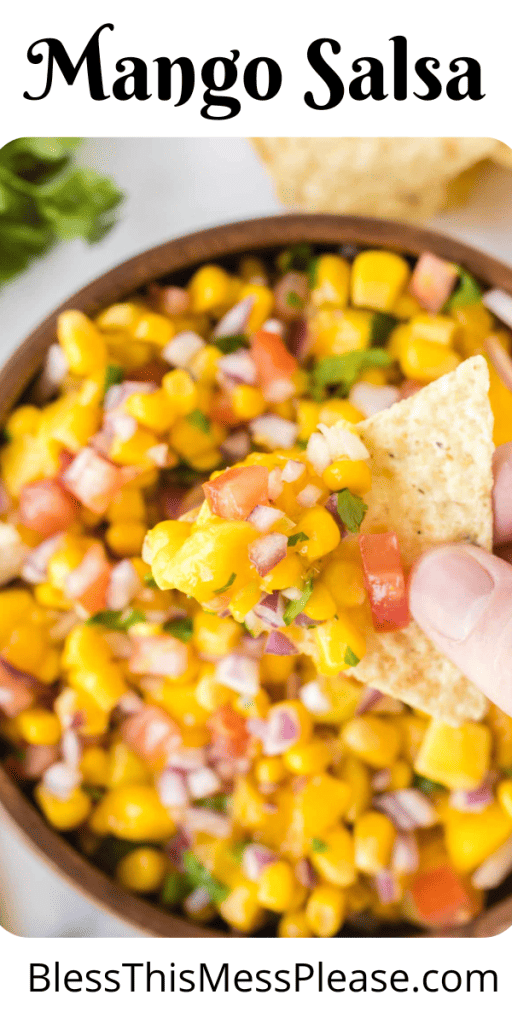 pin for mango salsa recipe with images of the salsa in a wooden bowl and with chips and lime as sides