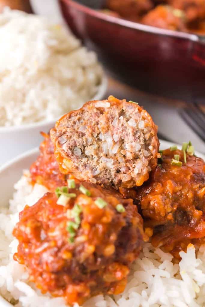Porcupine meatballs on top of rice.