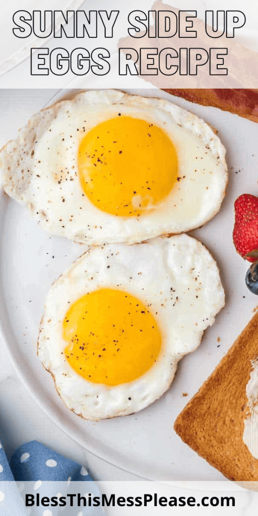 Two eggs that are cooked sunny side up.