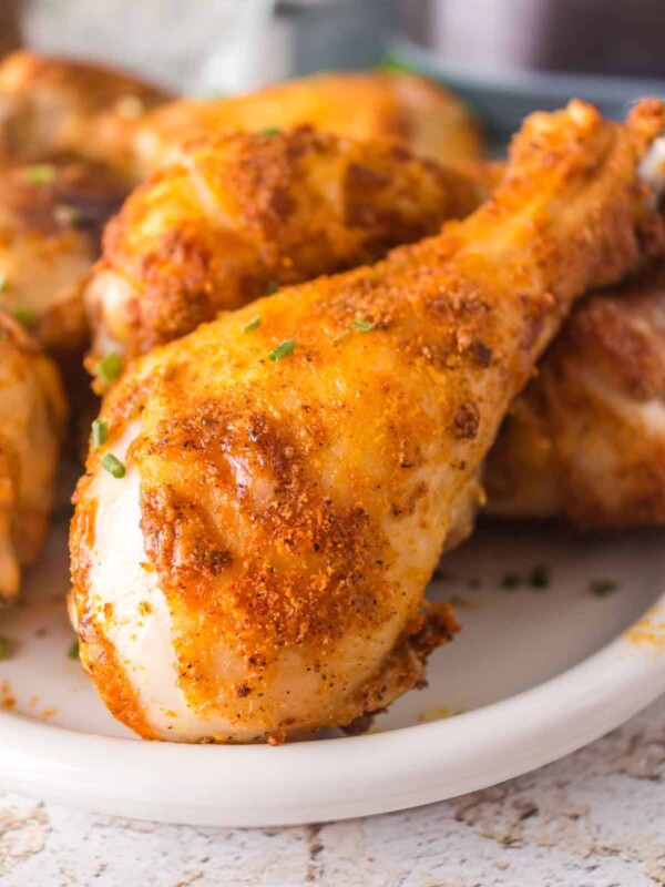 golden crisp air fried chicken drumsticks close up