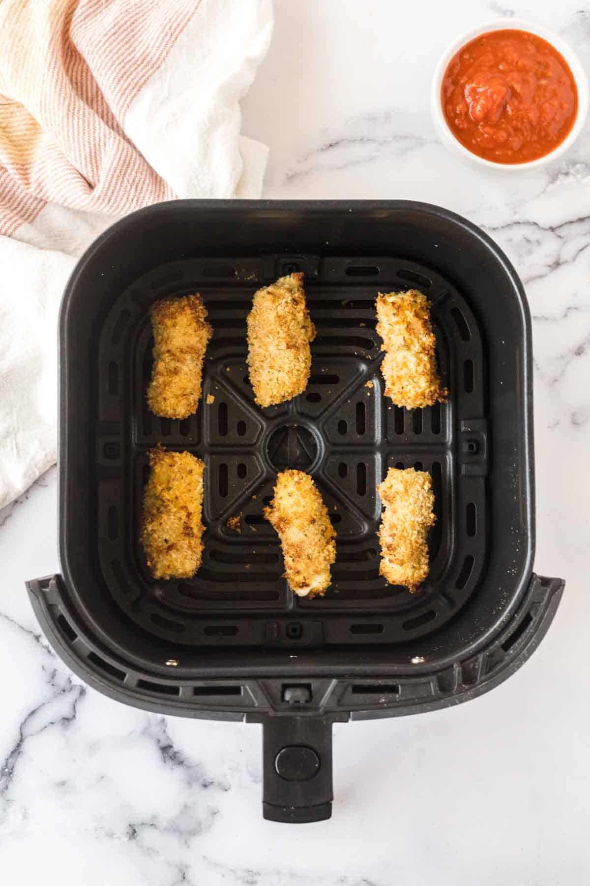 air fryer with homemade mozzarella sticks