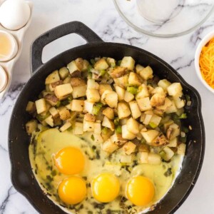 raw ingredients being cooked for breakfast skillets