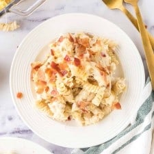 Chicken bacon ranch casserole served on a white plate