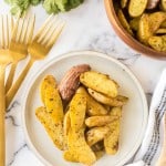 roasted fingerling potatoes on a white plate