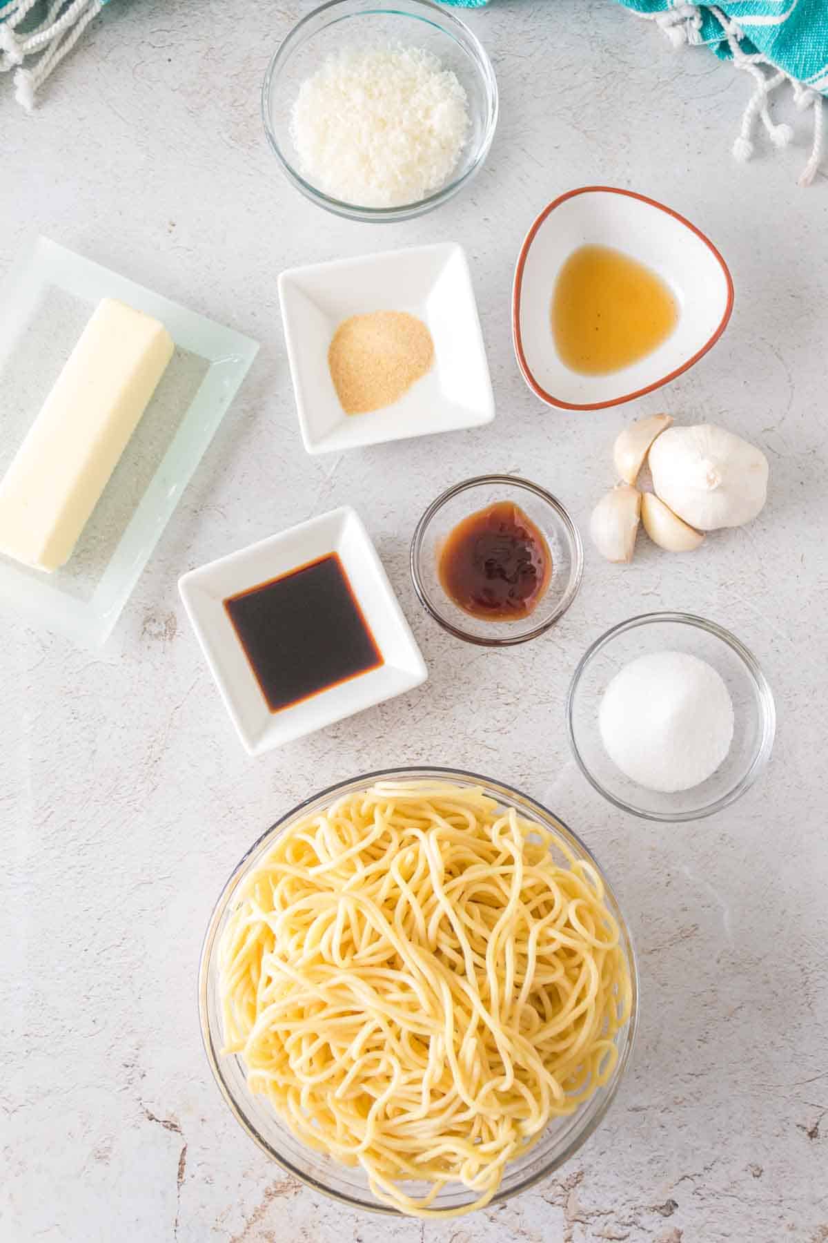 raw ingredients for garlic noodles in portion dishes