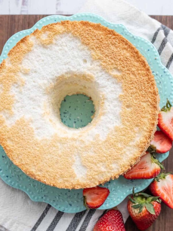 top view of the circled shaped angel food cake on a blue plate