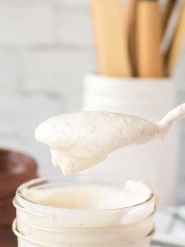 horseradish sauce spooned out of a mason jar