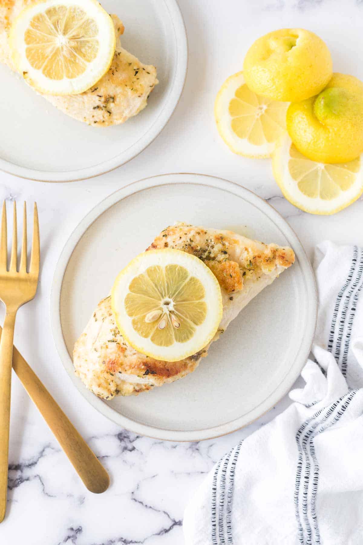 lemon chicken on a white plate