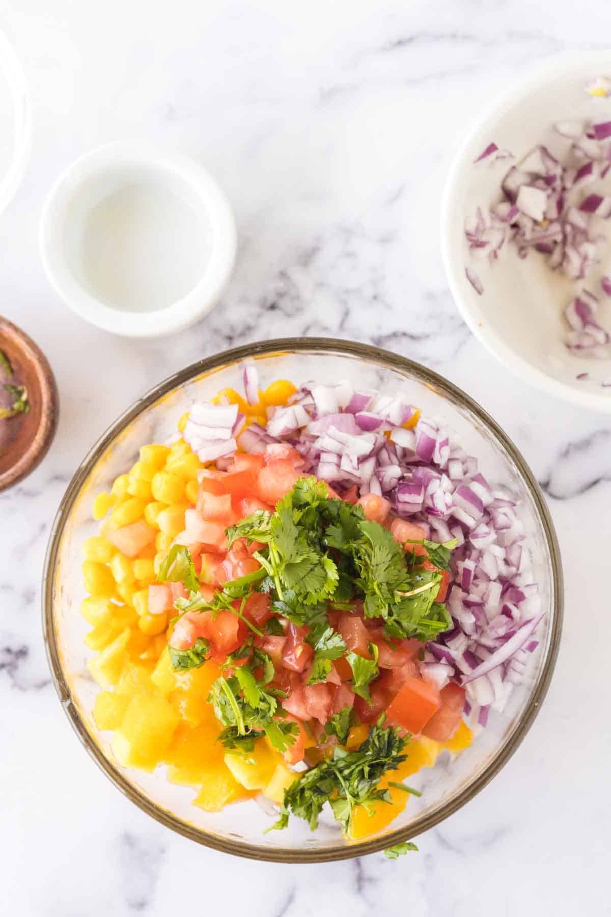 mango salsa ingredients before being mixed