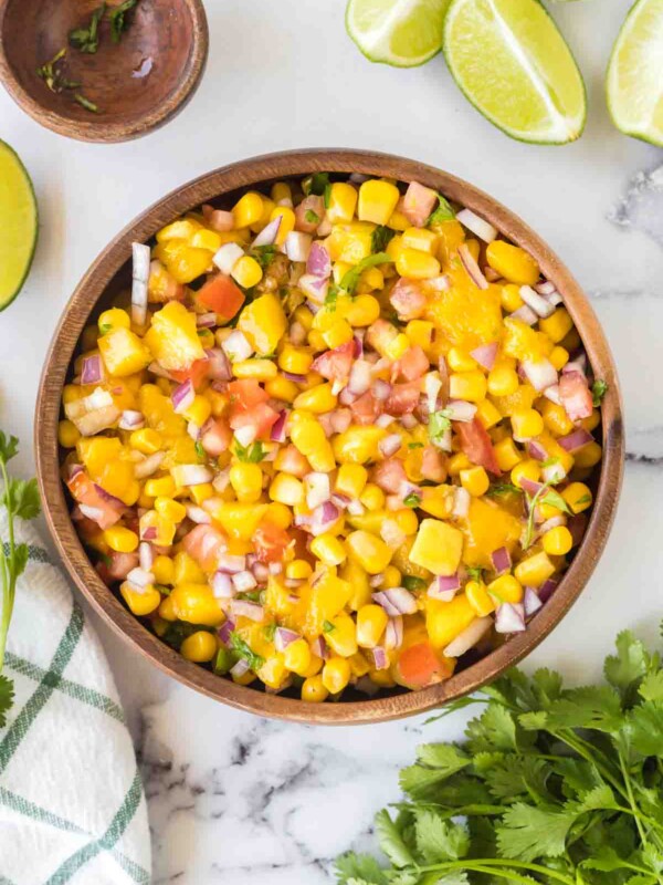 mango salsa in a wooden mixing bowl