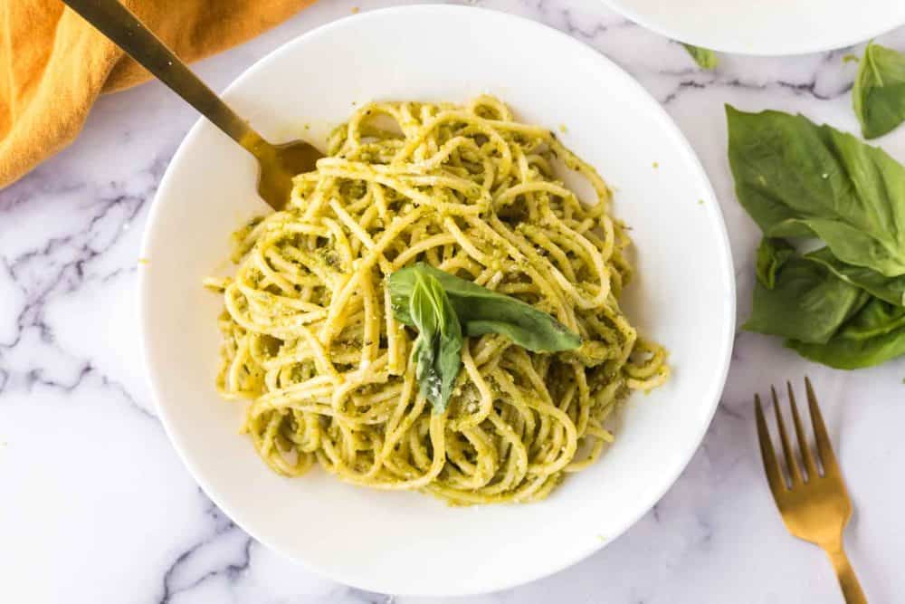 pesto pasta on a white plate