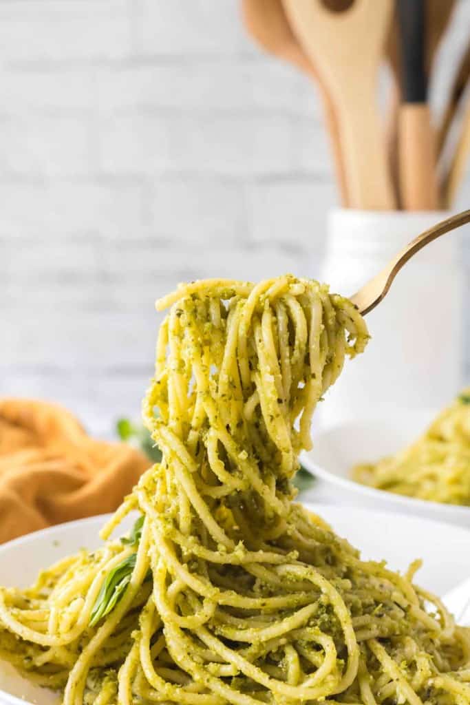 pesto pasta twirled on a fork