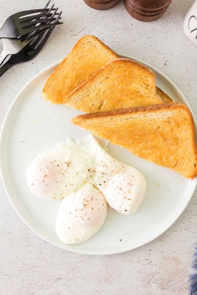 poached egg on a plate with toast