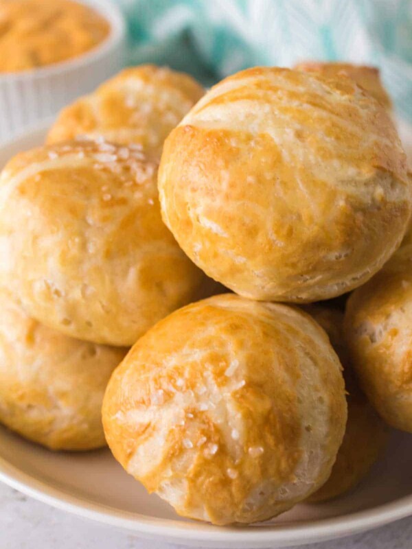 small pretzel bites with sea salt stacked onto a plate