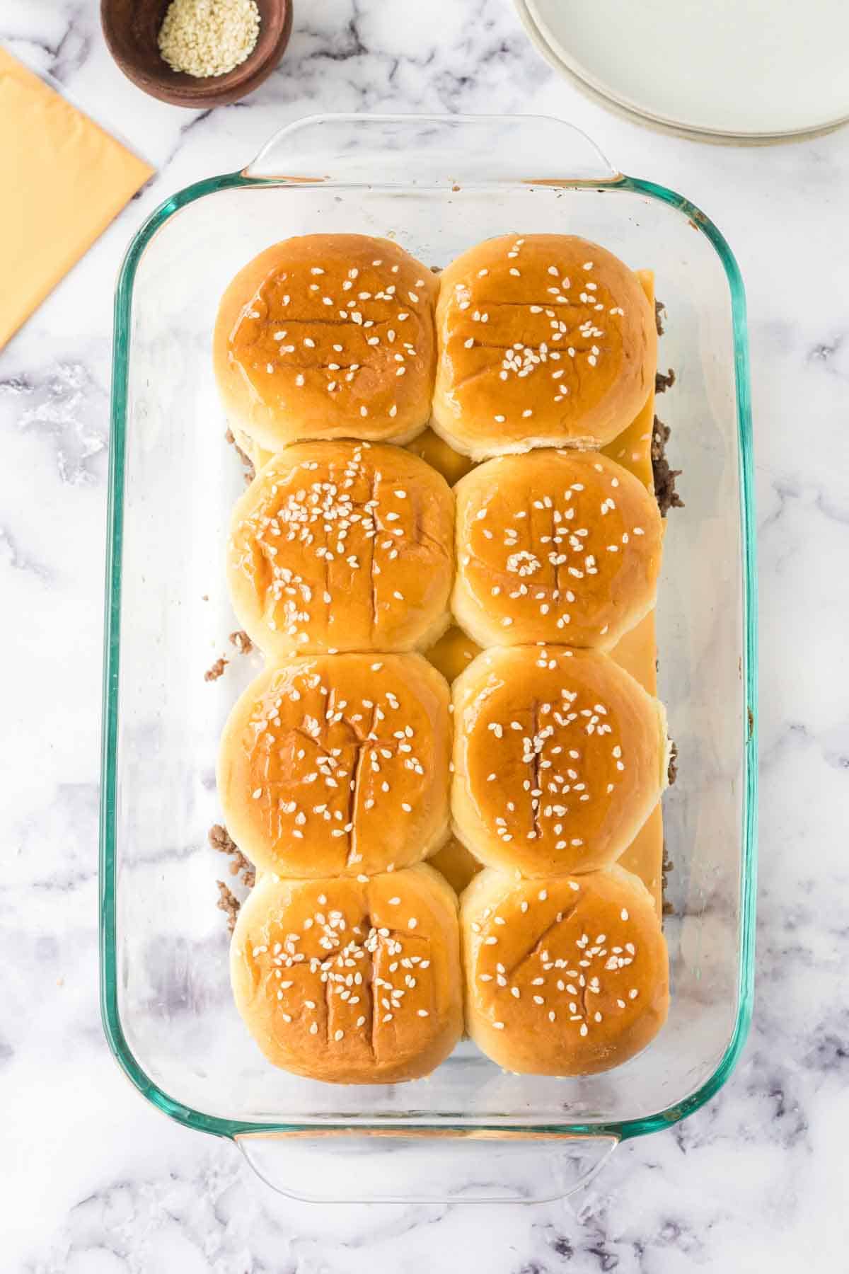 Baking dish full of sliders.