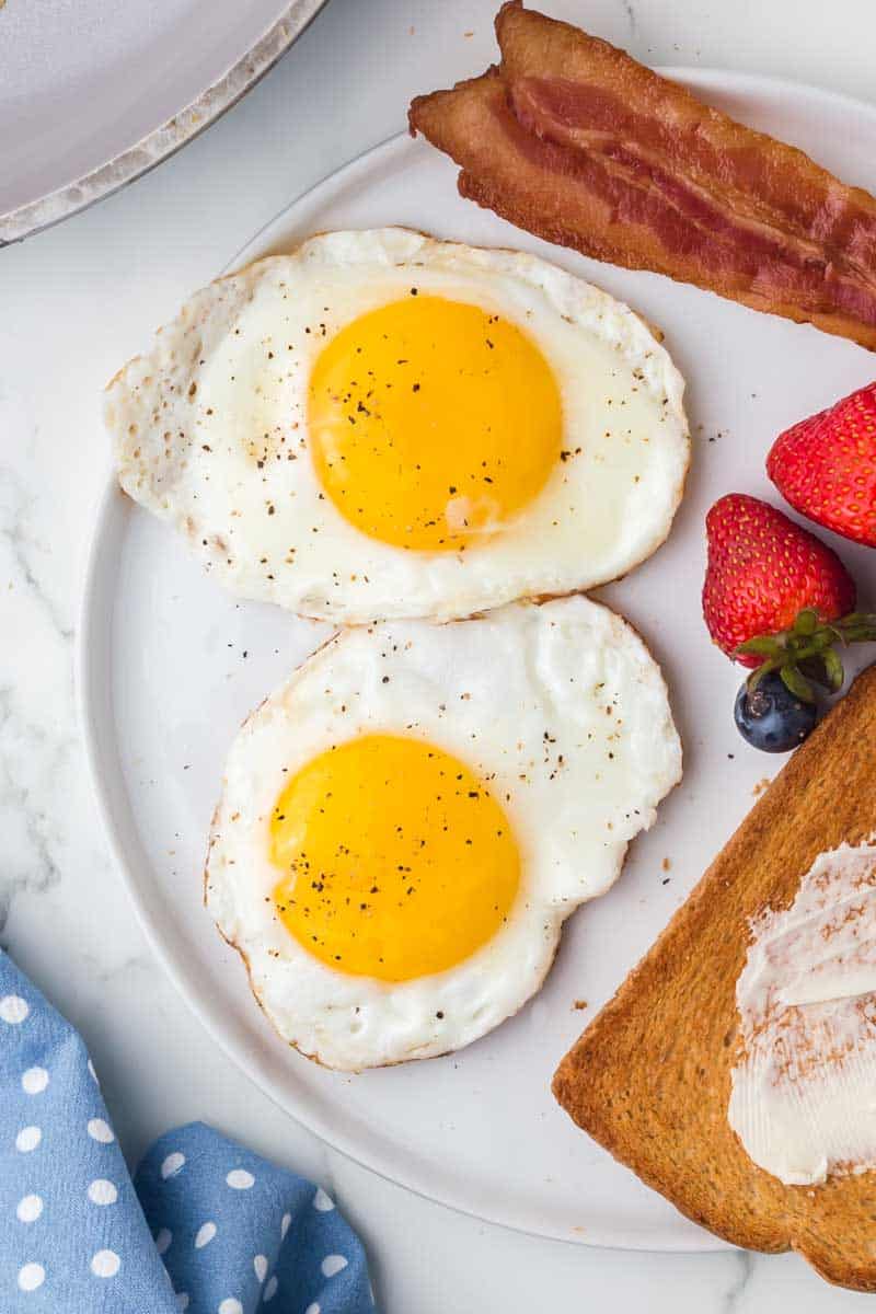 2 eggs cooked sunny side up.