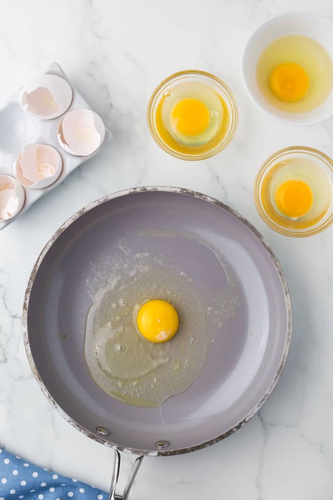 Egg cooking in a skillet.