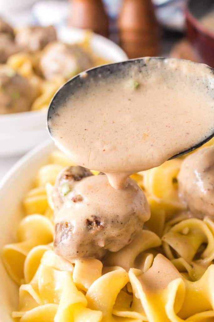 swedish meatball sauce poured over meatballs