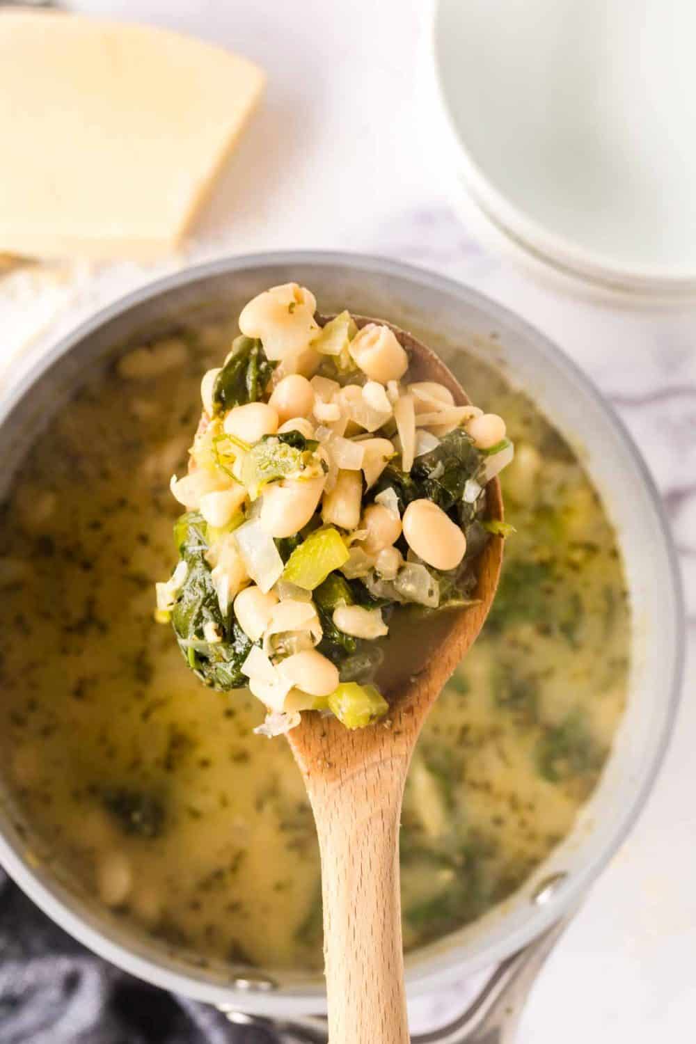 white bean soup recipe pot on a spoon