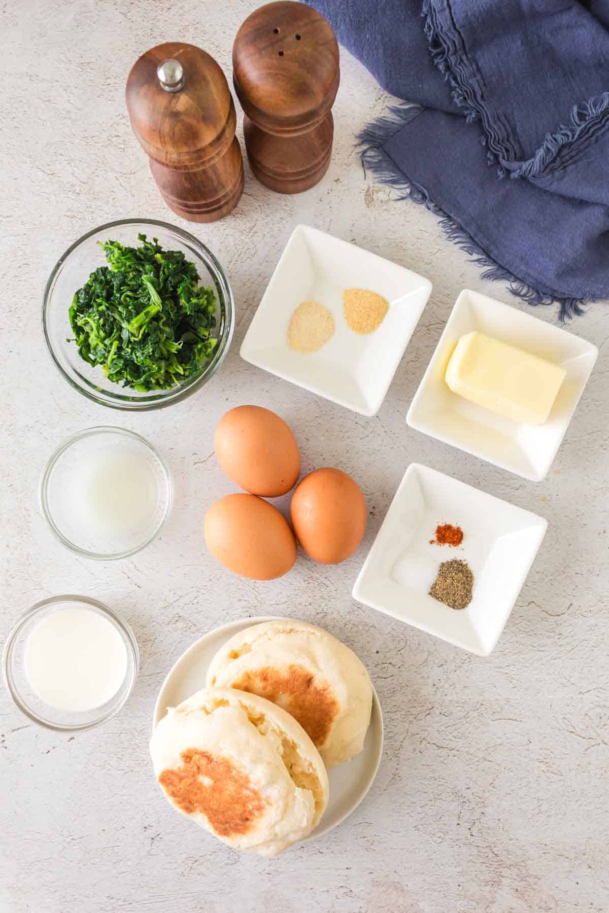 eggs florentine ingredients portioned on the table