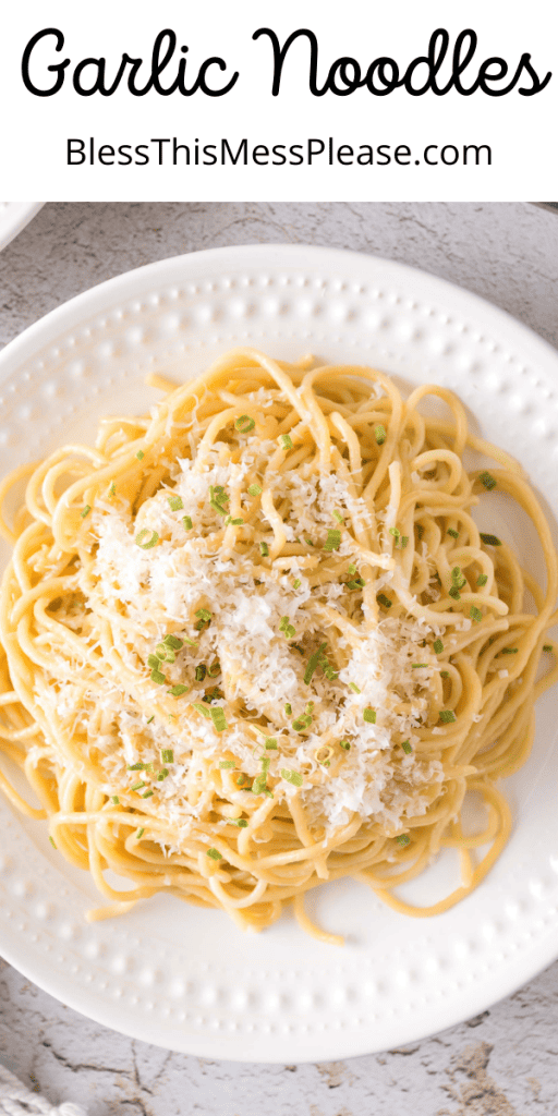 pin that reads garlic noodles with a white plate of noodles, shredded cheese, and herbs