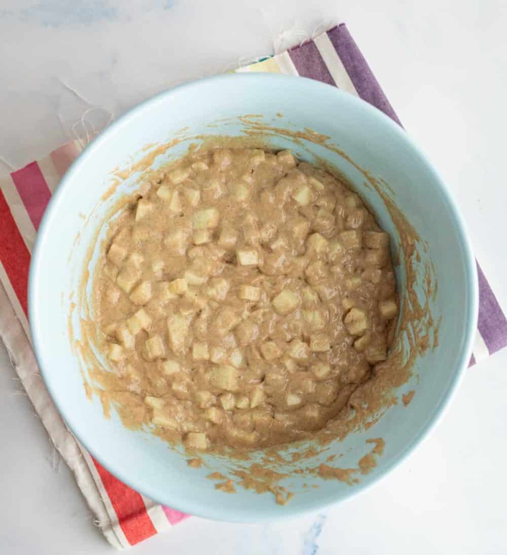 apple fritter batter in a mixing bowl