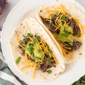 barbacoa tacos on a plate