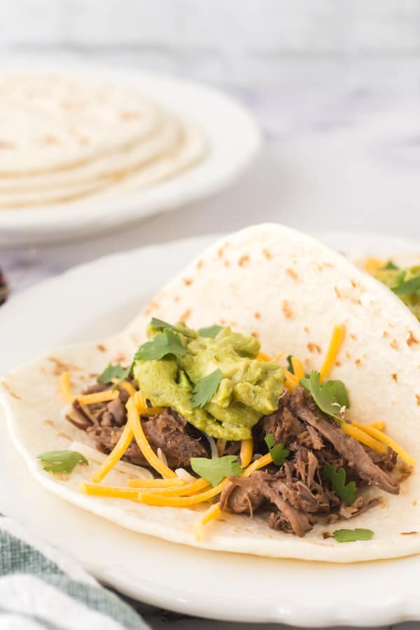 barbacoa tacos on a plate