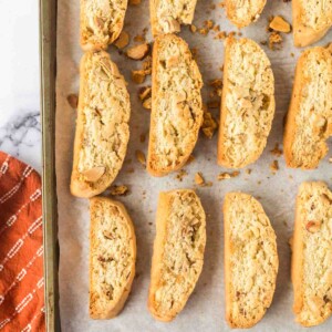 biscotti in rows on a baking sheet