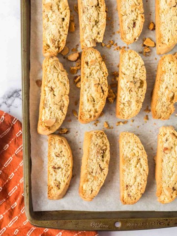 biscotti in rows on a baking sheet