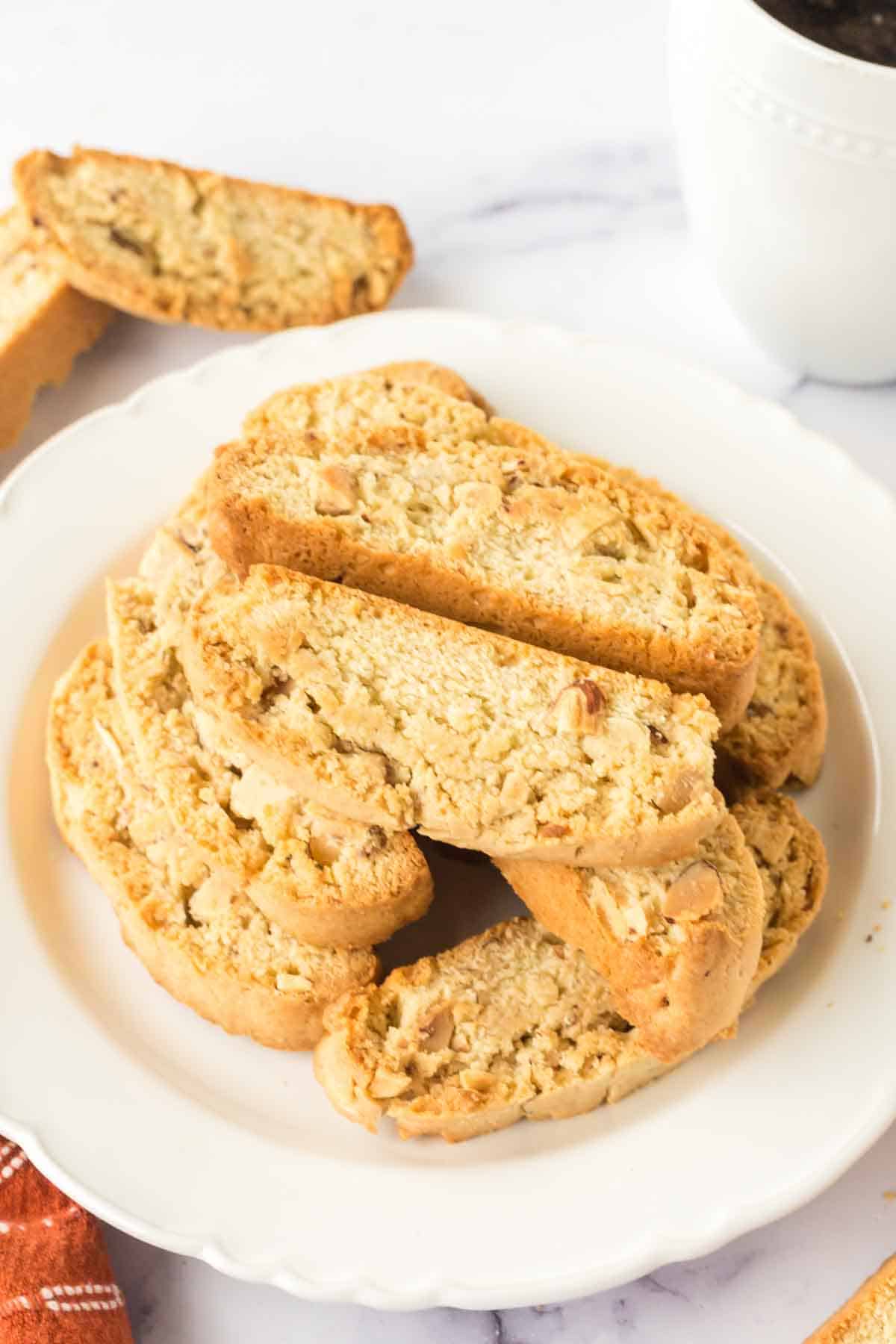 biscotti stacked onto a white plate