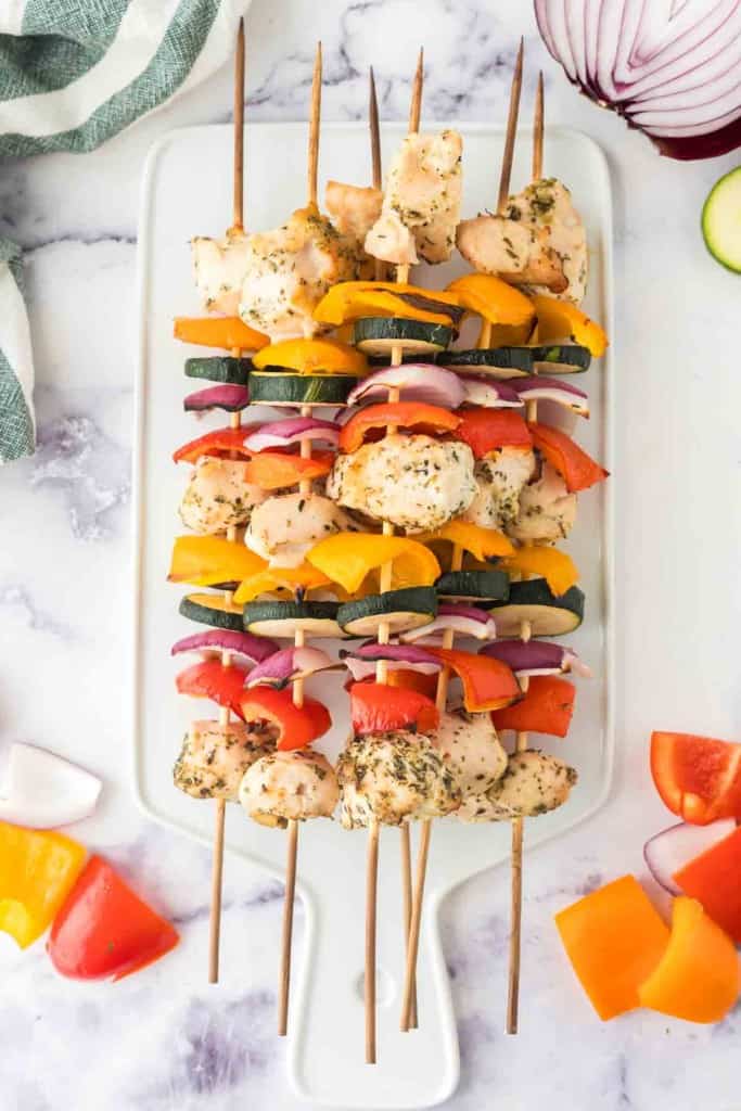 chicken kabobs with skewered chicken zucchini onion and peppers