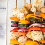 chicken kabobs with skewered chicken zucchini onion and peppers